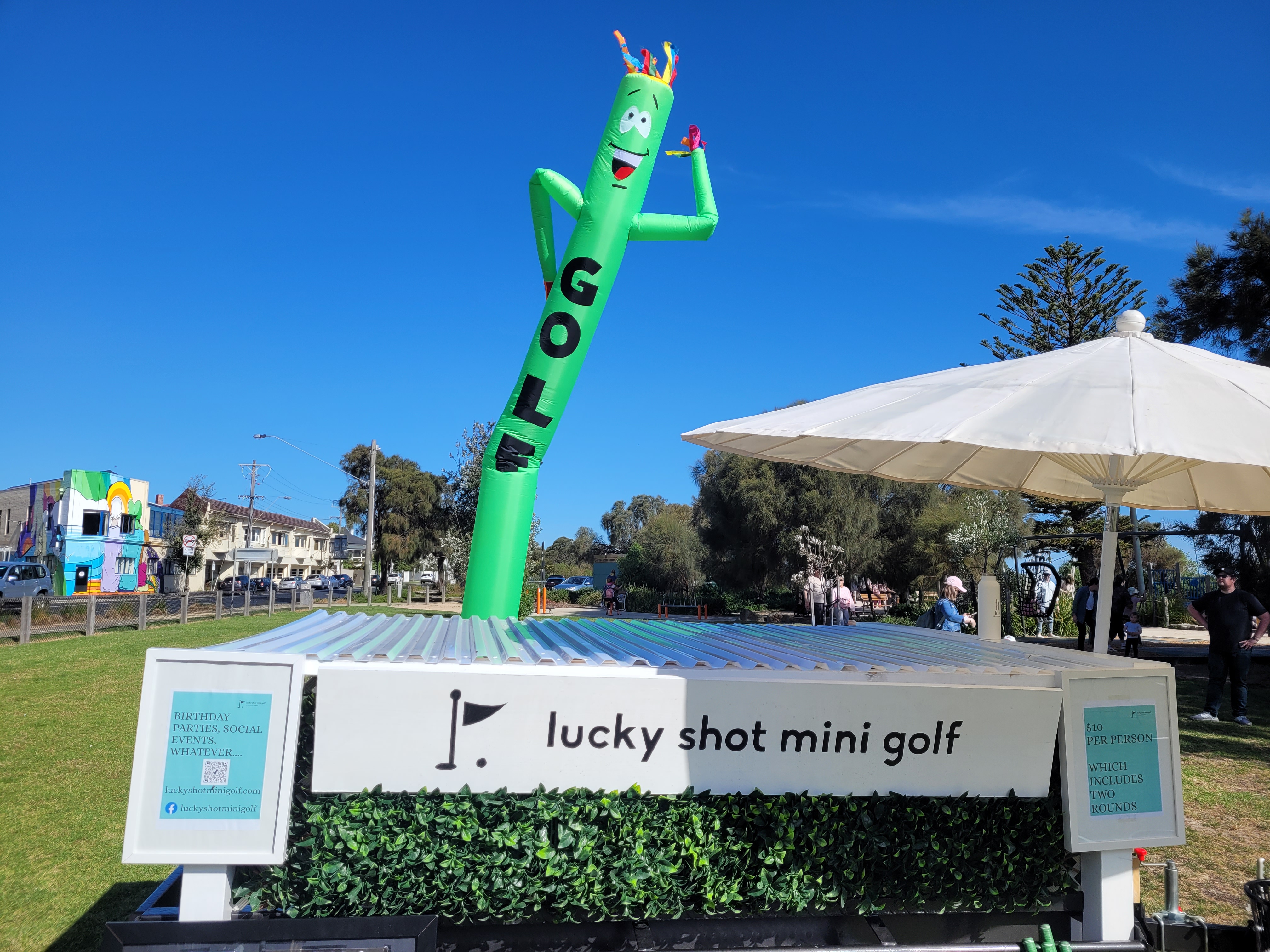 Lucky Shot branded outdoor event with inflatable golf character