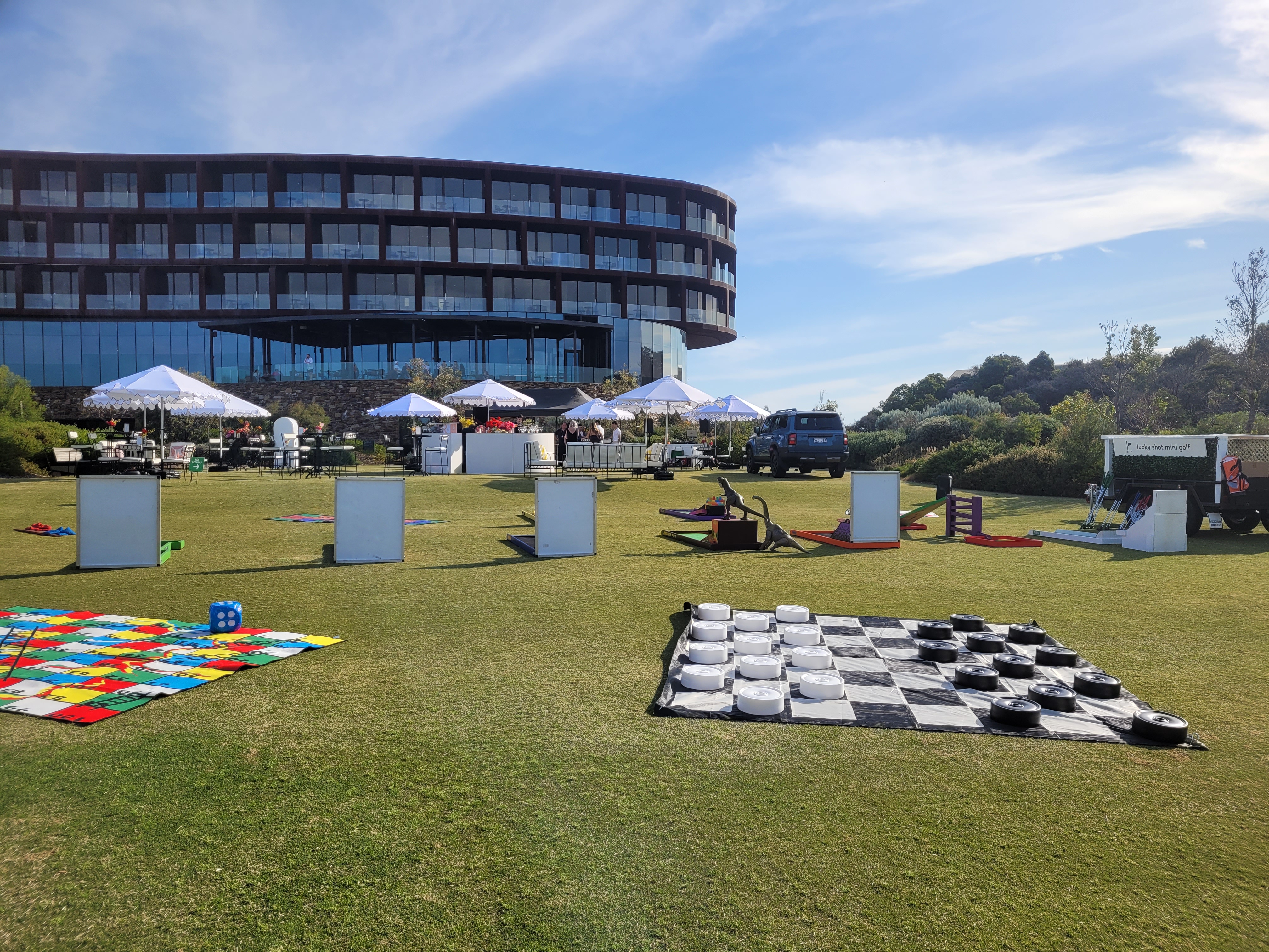 Corporate retreat with giant games and mini golf on a resort lawn