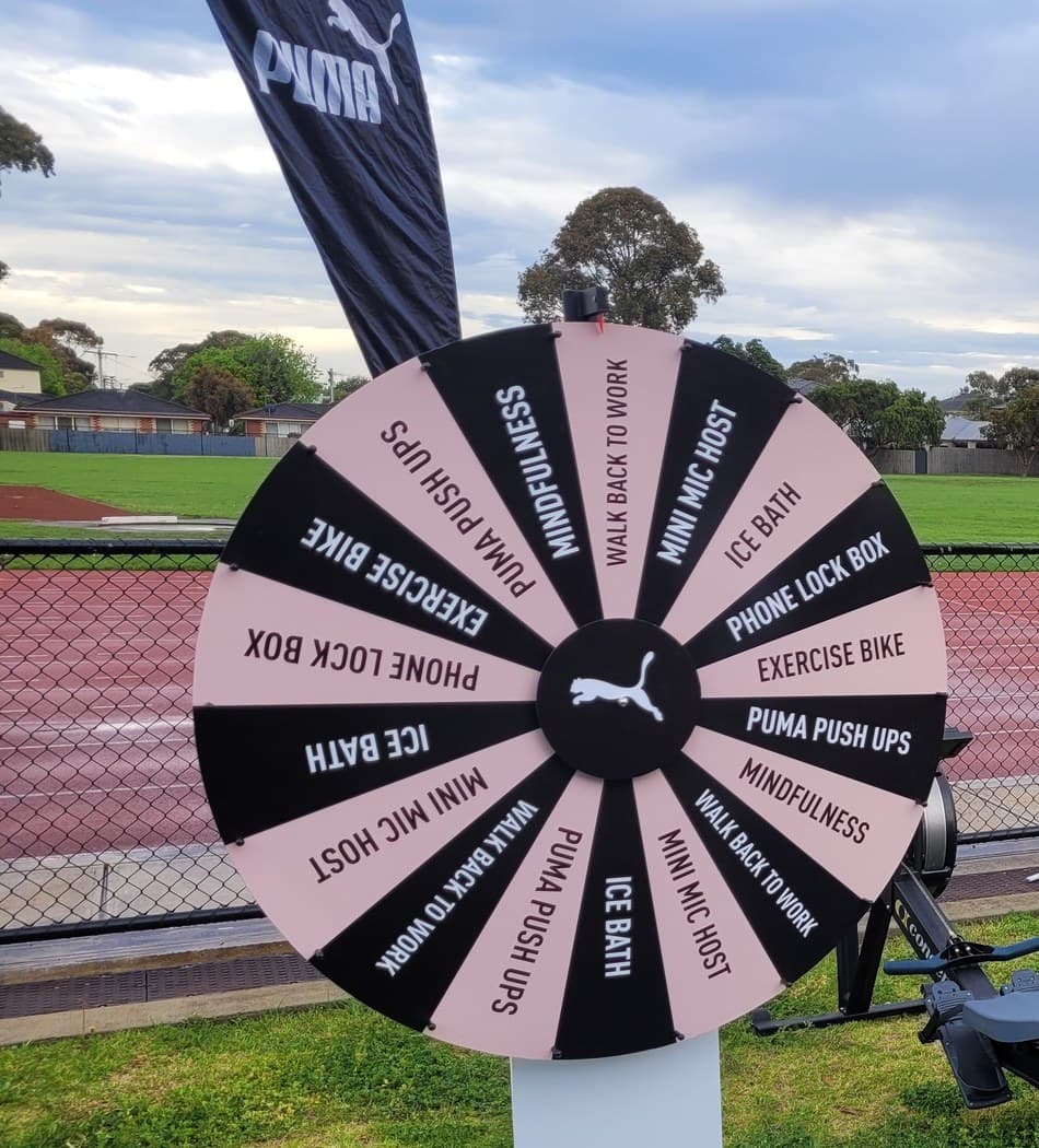 Spinning prize wheel at a Melbourne corporate exhibition