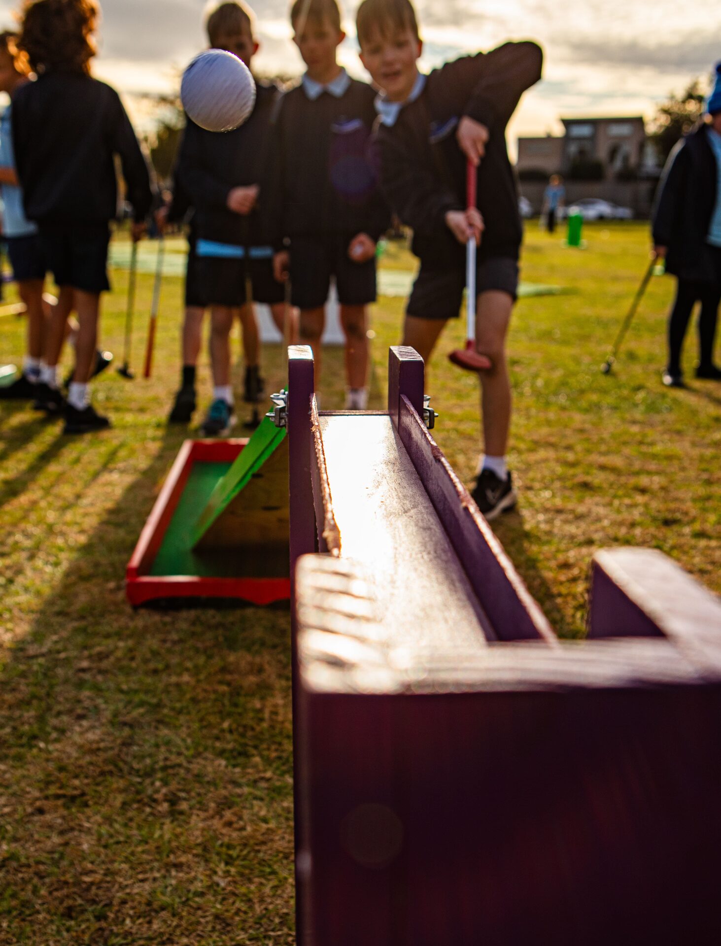 Kids playing mini golf at a Melbourne birthday party