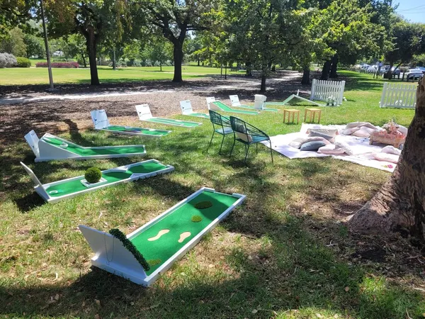 Lucky Shot Mini Golf course elegantly set up at a Melbourne park for an outdoor event