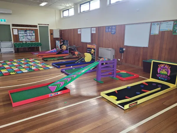 Lucky Shot Mini Golf course laid out along a long Melbourne office corridor