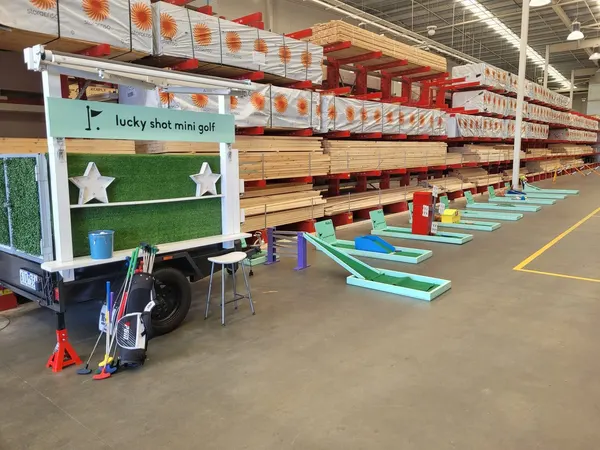 Lucky Shot Mini Golf full nine-hole course set up in a Melbourne corporate event space with high ceiling