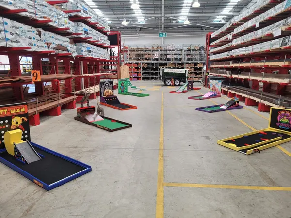 Lucky Shot Mini Golf course set up inside a Melbourne warehouse-style corporate venue