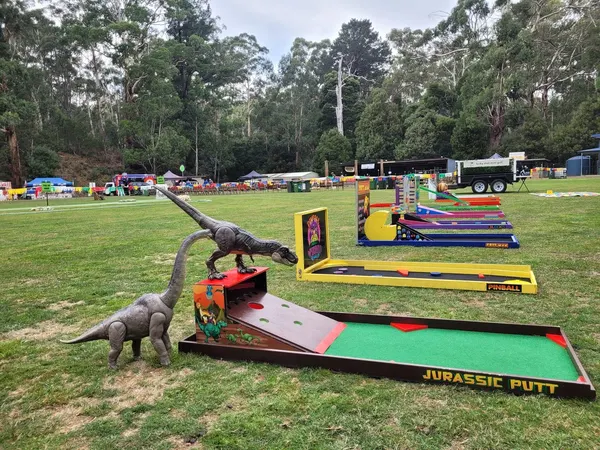 Lucky Shot Mini Golf course set up at a Melbourne park with Mario character cutouts on the lawn