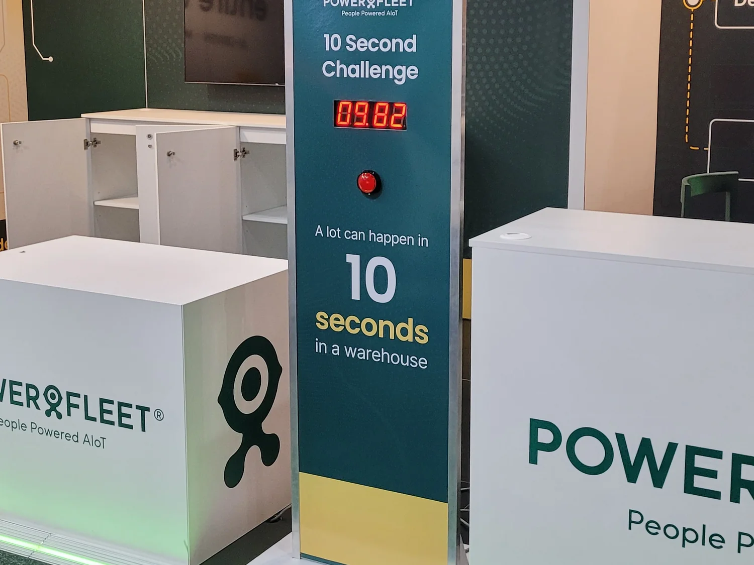 Branded 10 Second Challenge reaction game cabinet on the Powerfleet exhibition stand at a Melbourne trade show