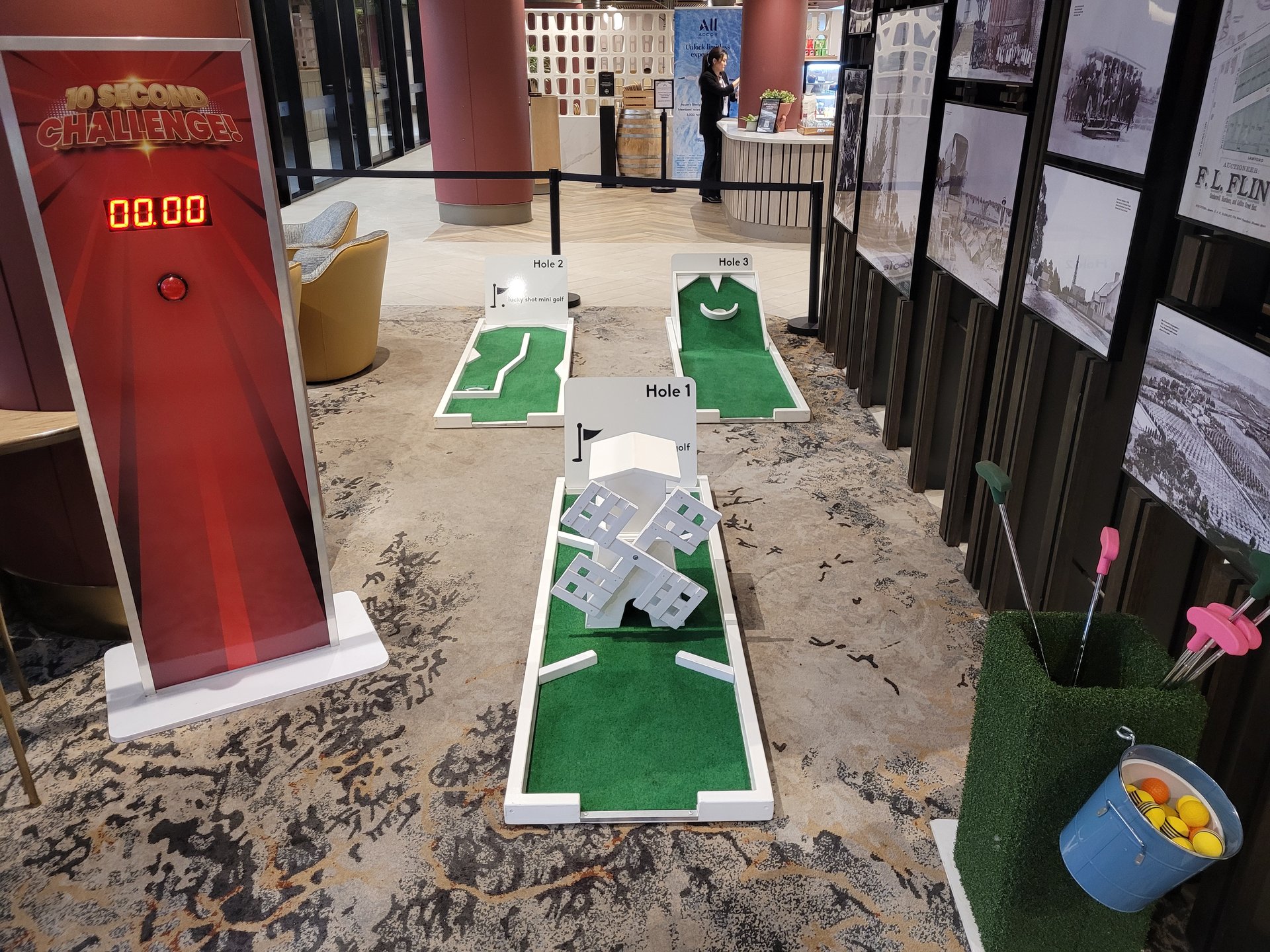 Lucky Shot 3-hole mini golf course with branded 10 Second Challenge cabinet at a Melbourne conference booth