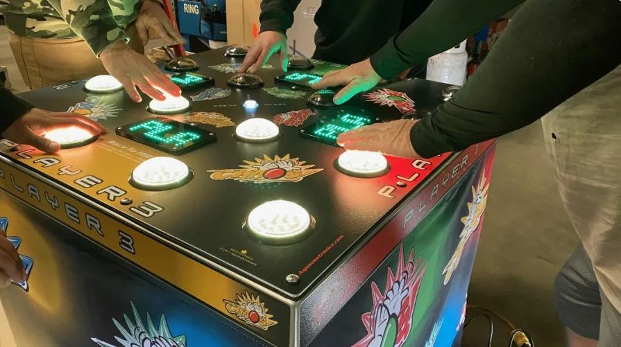 Chaos 4-player Strike A Light reaction game at a Melbourne conference booth