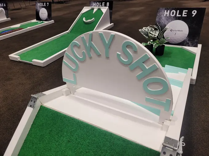 The Lucky Shot branded arch on the mini golf course at the TaylorMade Club House event