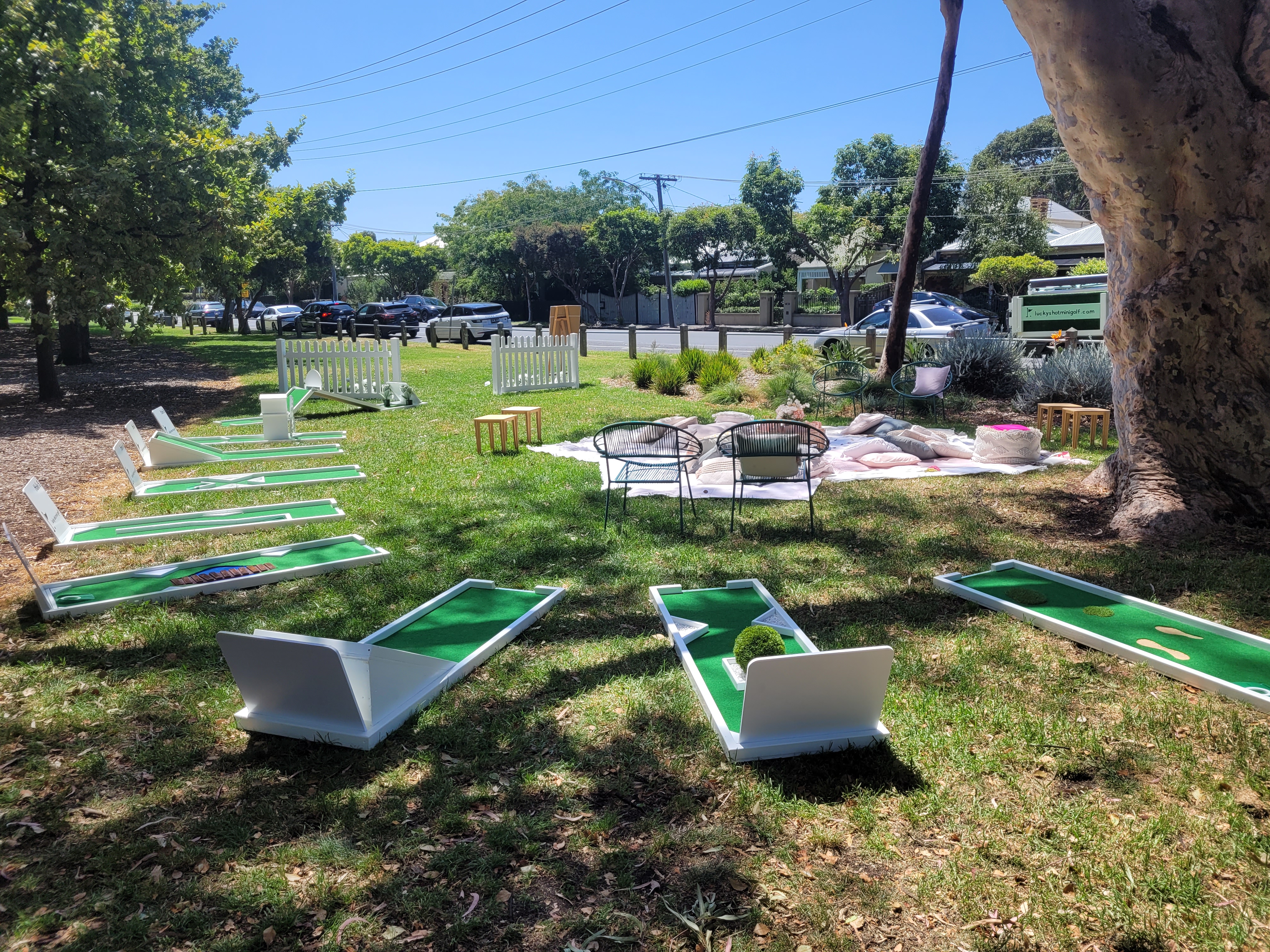 White picket fence mini golf course at Melbourne outdoor wedding venue