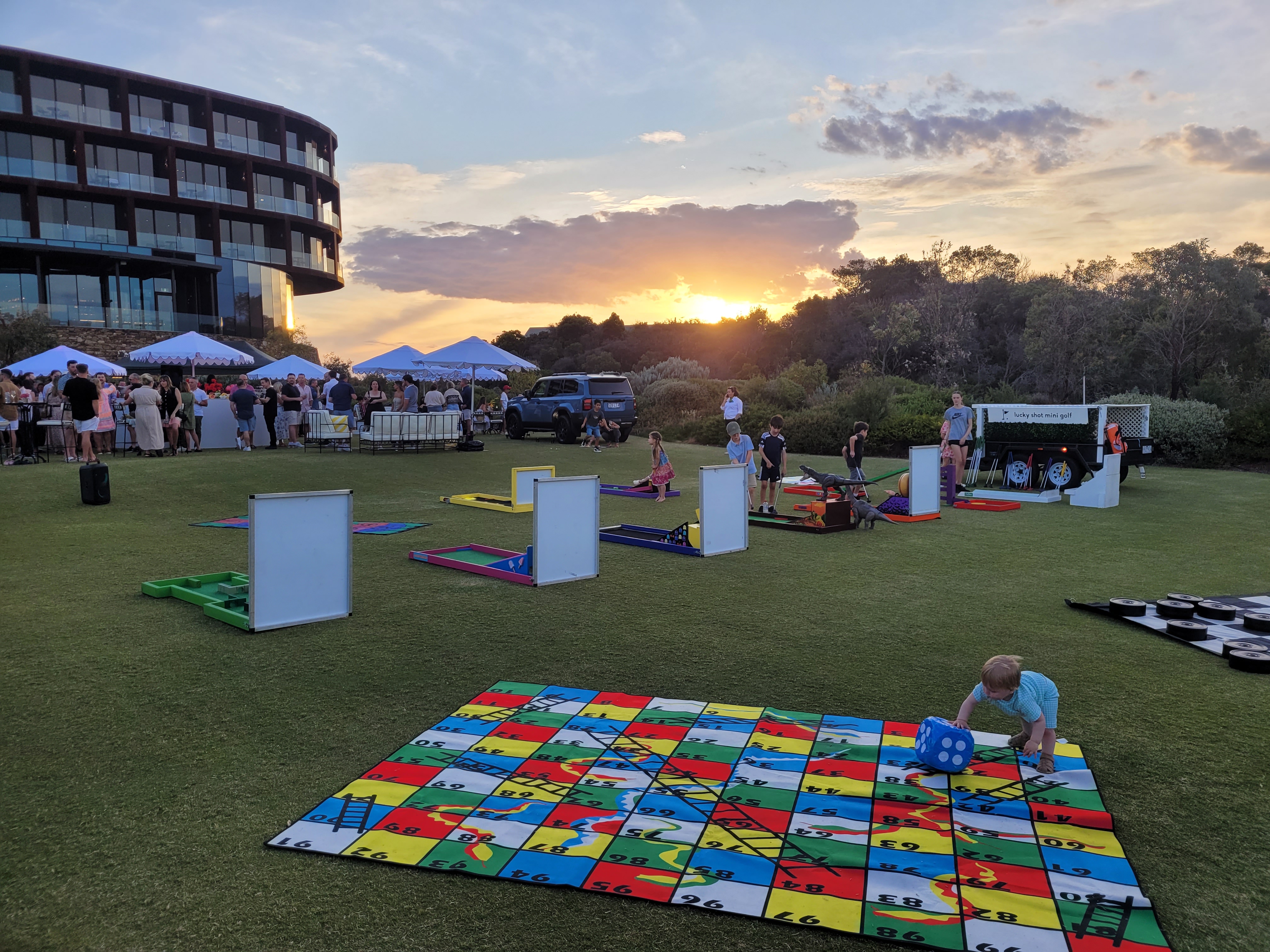 Lucky Shot lawn games at Melbourne outdoor sunset event — Giant board games and activities