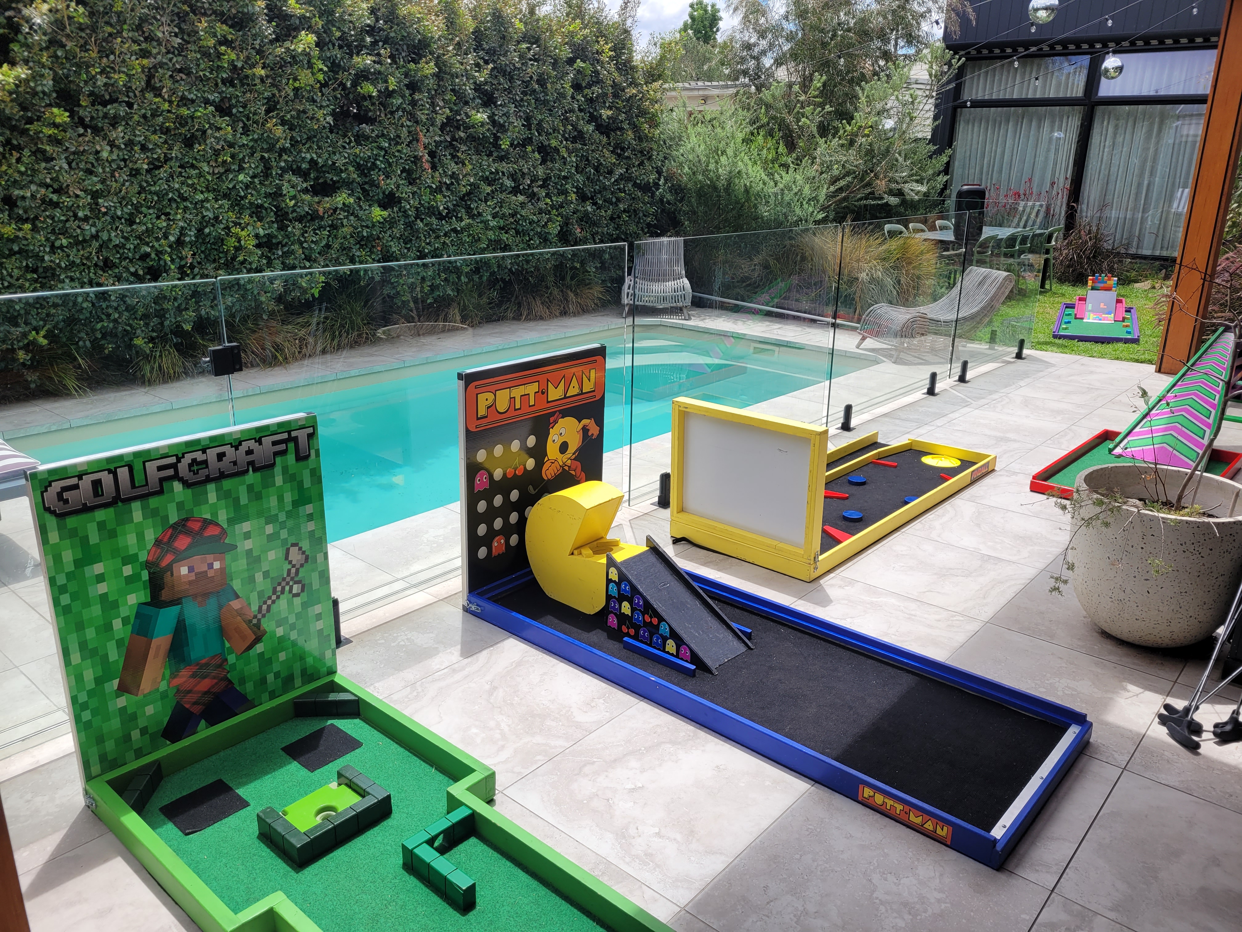 Video game themed mini golf at Melbourne kids birthday party near pool
