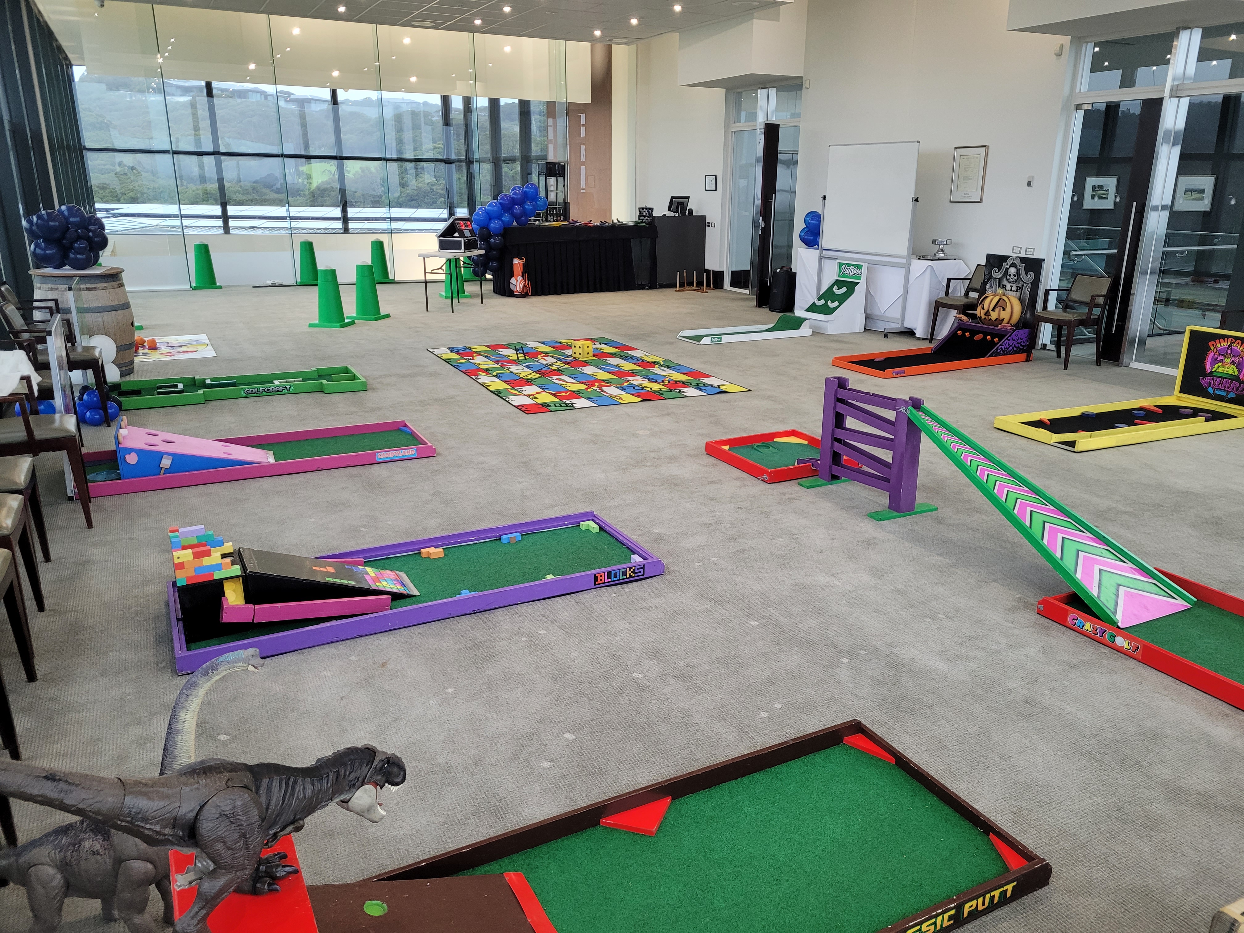 Lucky Shot indoor office fun zone — mini golf with dinosaur obstacles in Melbourne office