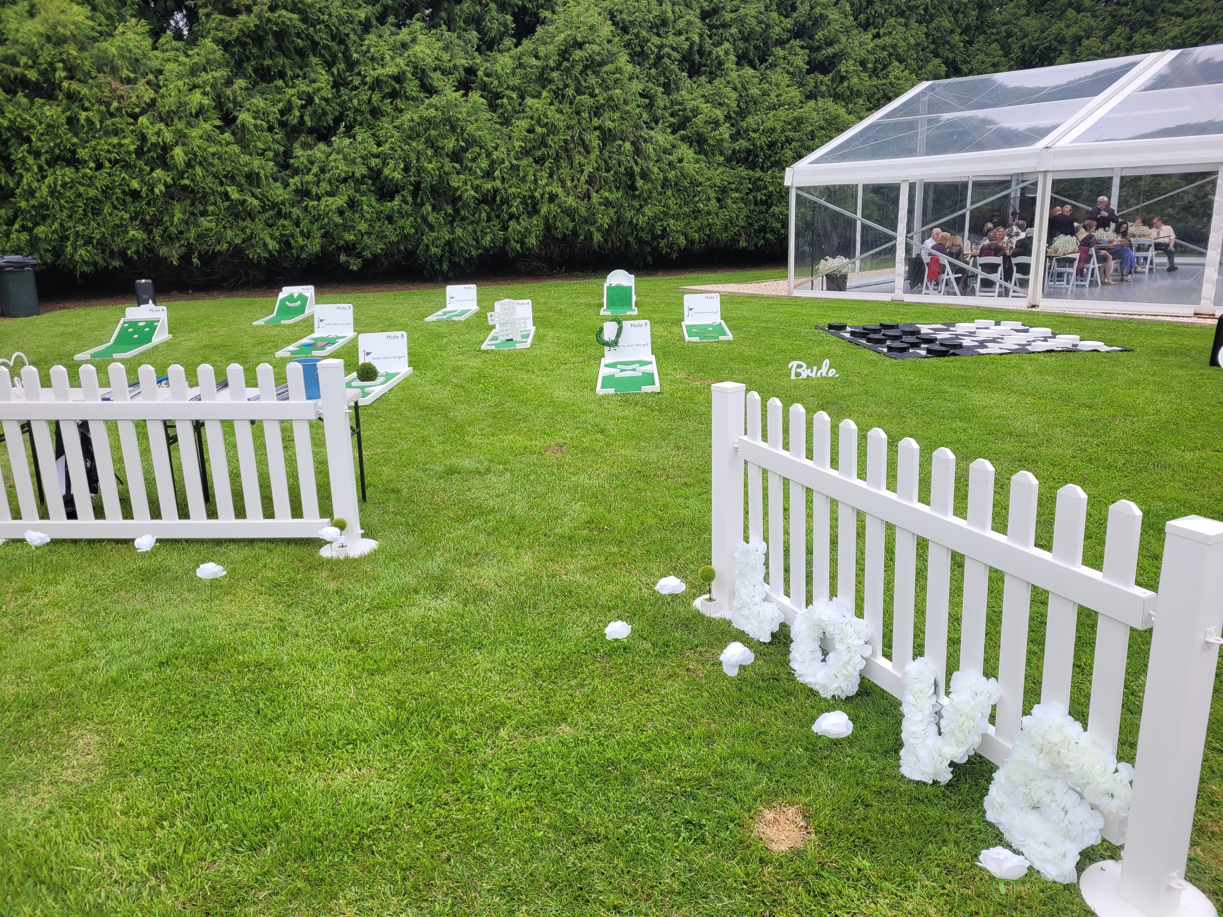 Lucky Shot lawn games at Melbourne garden event — white picket fences and Giant games