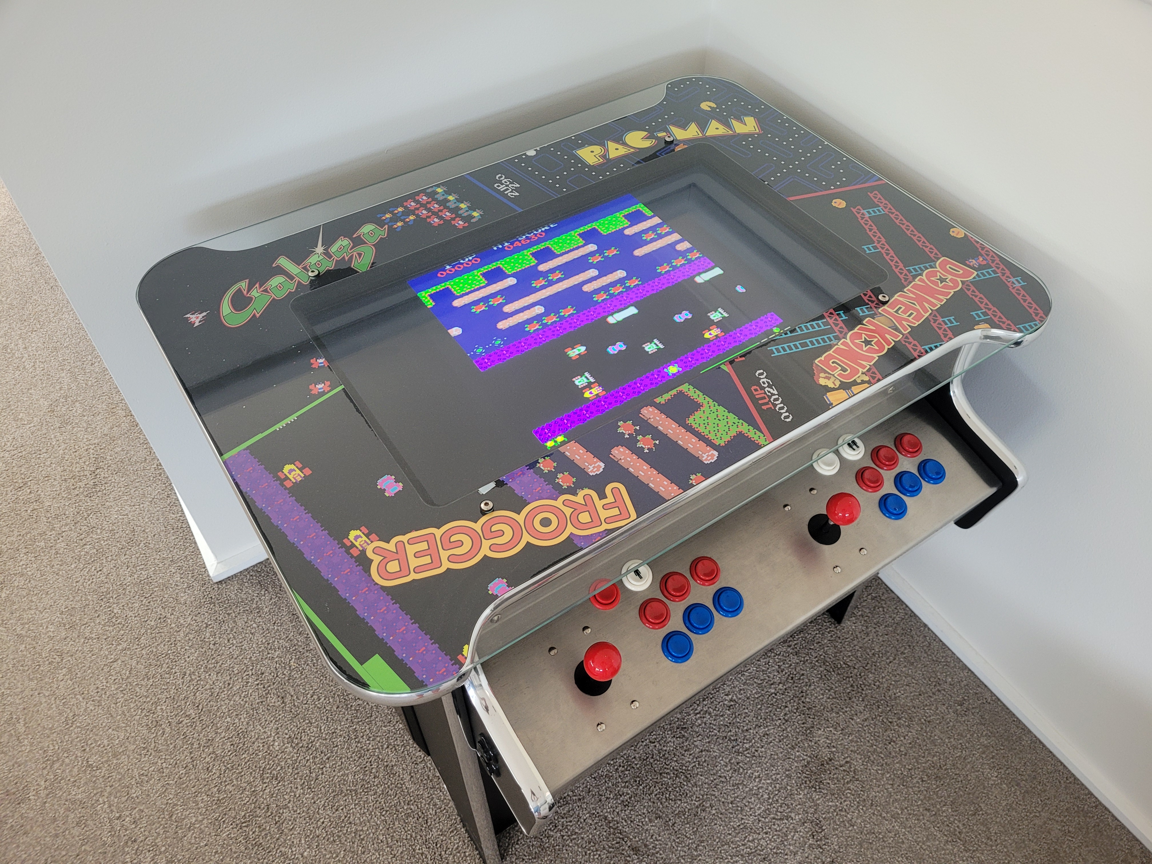 Arcade coffee table with Pac-Man and Frogger — Lucky Shot corporate office arcade hire Melbourne