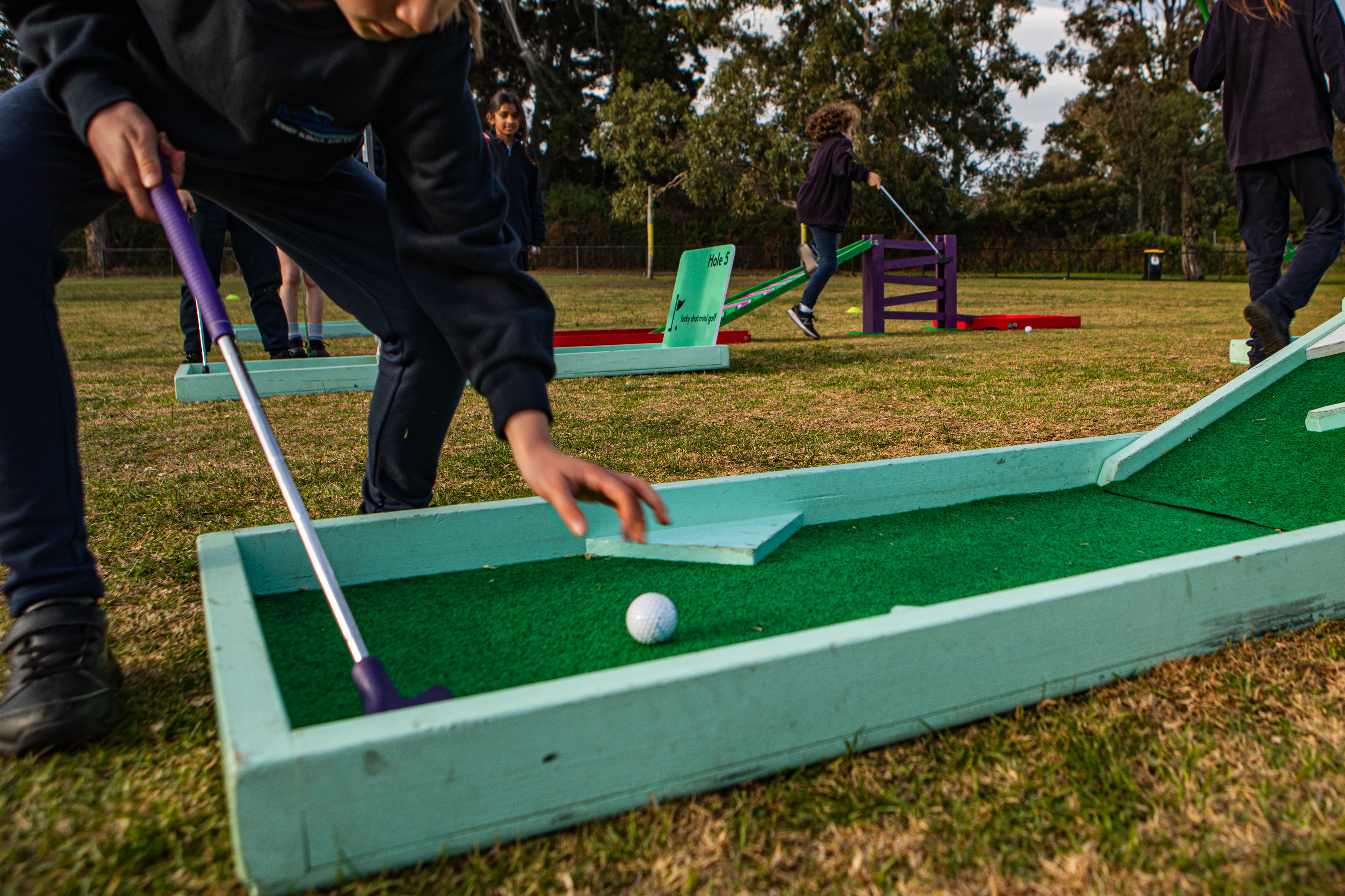 Lucky Shot mini golf at Melbourne wedding — professional event photography