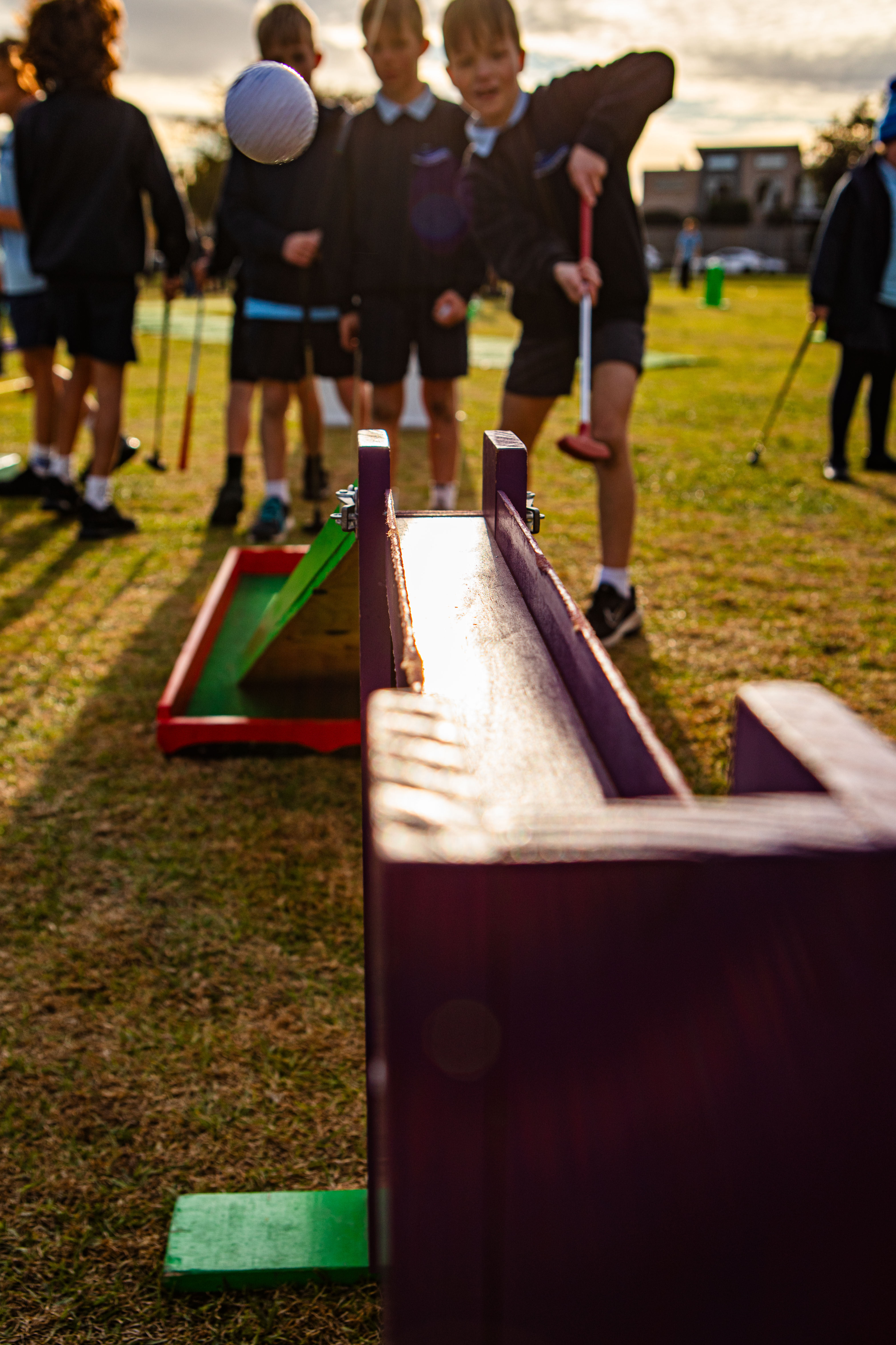Kids enjoying Lucky Shot mini golf at Melbourne birthday party